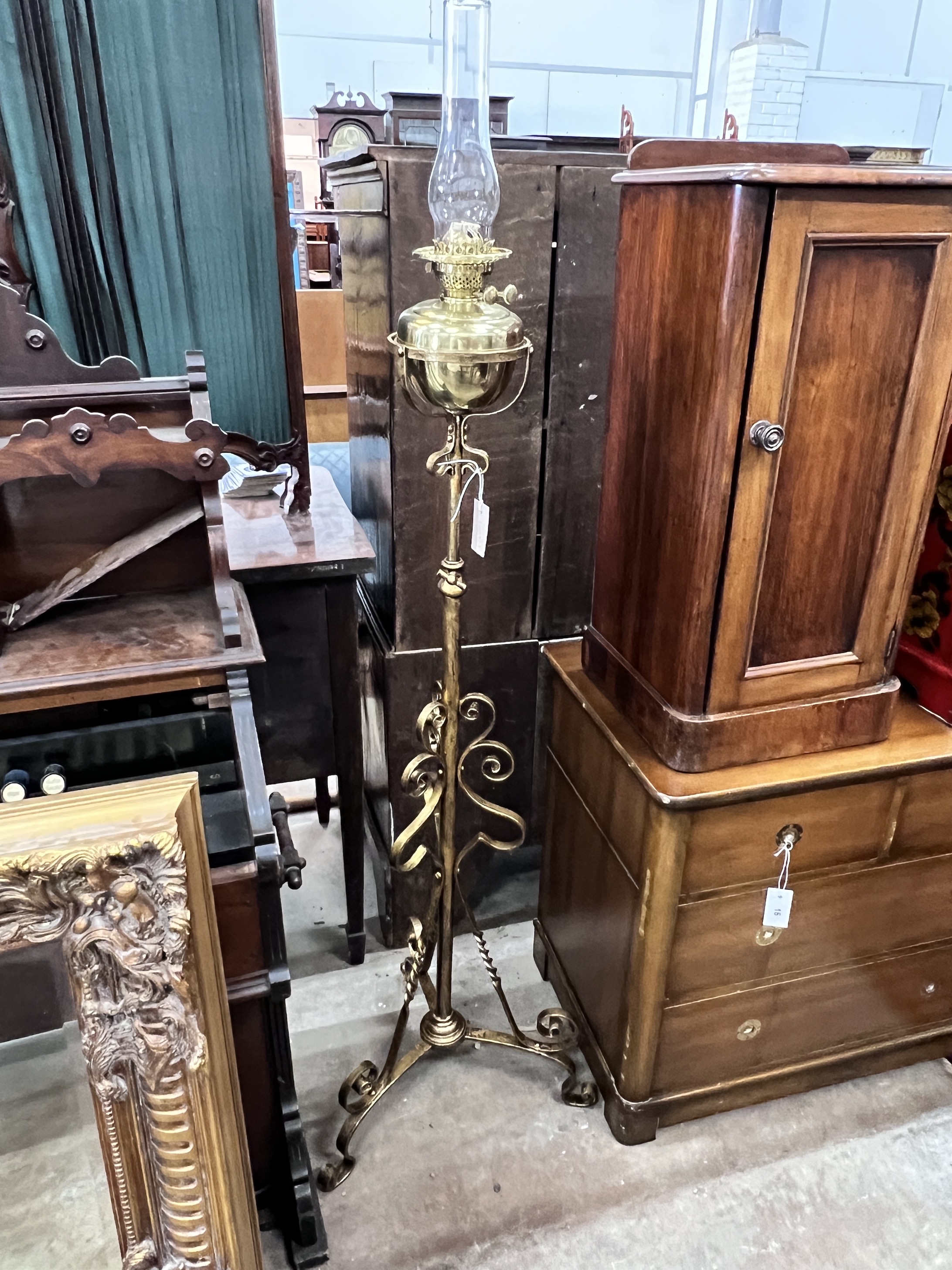 A late Victorian painted wrought iron telescopic oil lamp standard